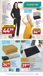 Gazetka promocyjna Aldi - Pełny katalog - Gazetka - ważna od 10.09 do 10.09.2022 - strona 31 - produkty: Ręcznik kąpielowy, Dywanik łazienkowy, Dywanik, Dres, Wełna, Ręcznik, Spodnie, Bluza, Spodnie dresowe, Bluza dresowa, Dywan, Fa